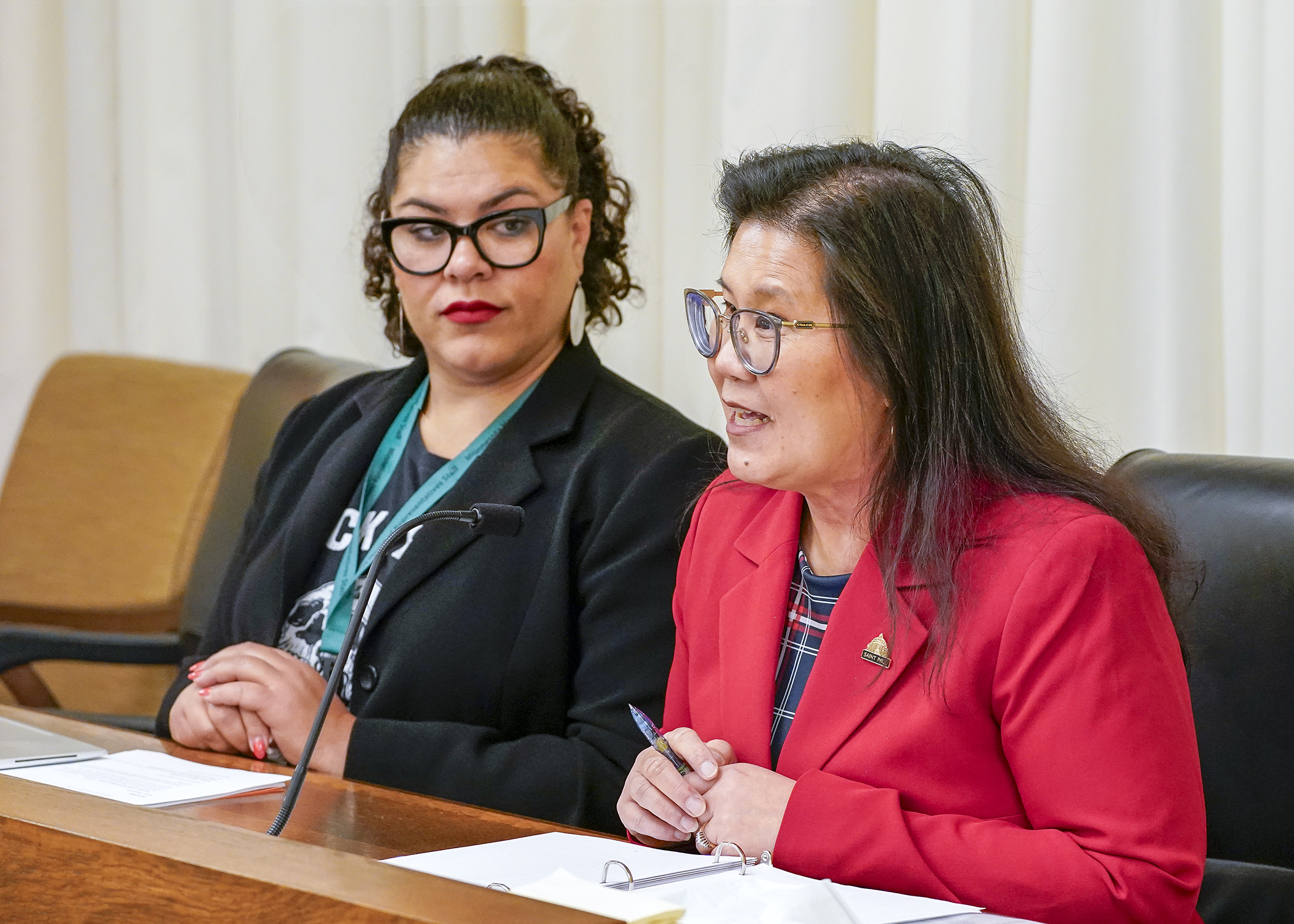 St. Paul Mayor Kaohly Her testifies before the House Taxes Committee April 29 for a bill sponsored by Rep. Athena Hollins, left, that would establish a fifth-tier income tax rate and increase aid to local governments and counties. (Photo by Andrew VonBank)